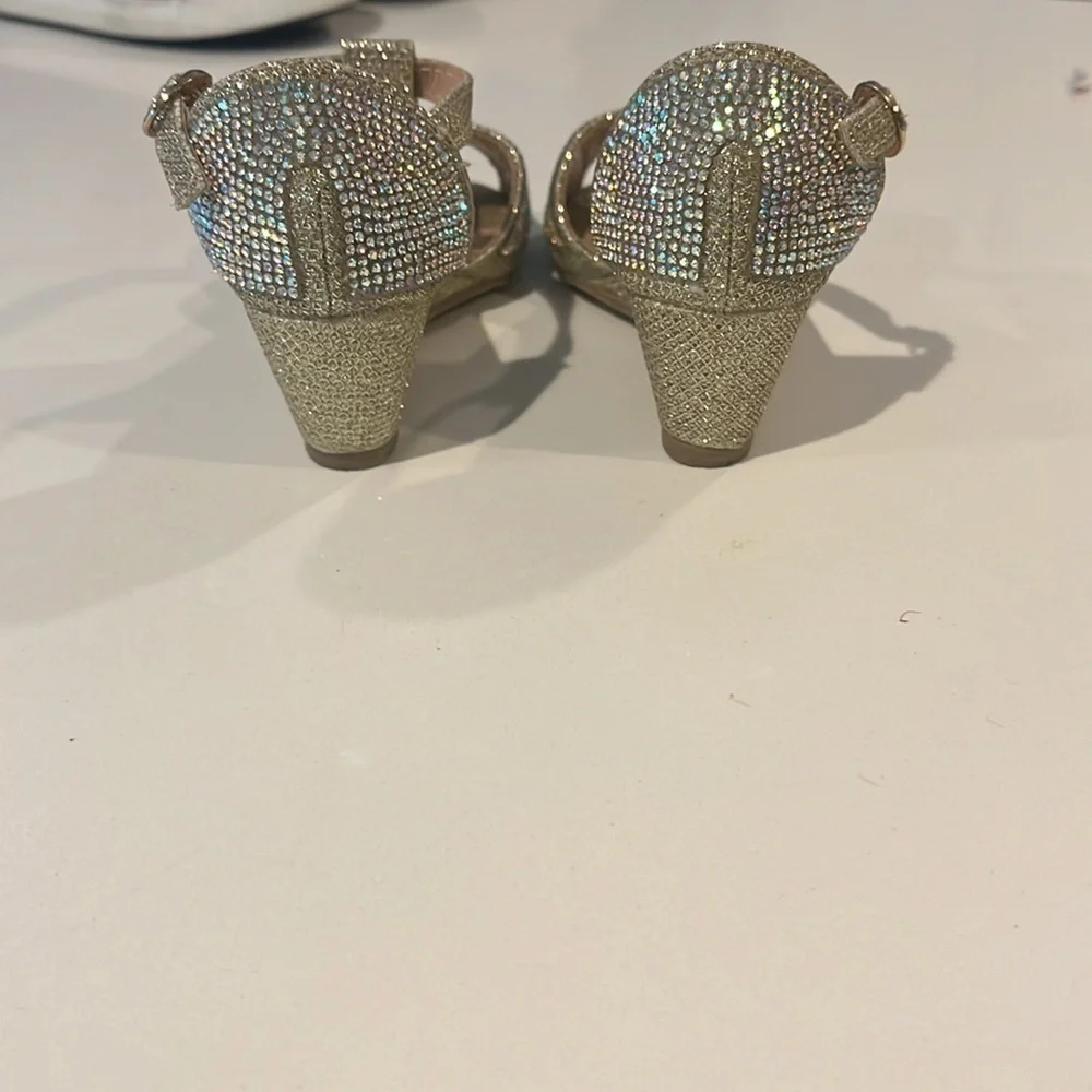 Gold sequined children’s dress shoes